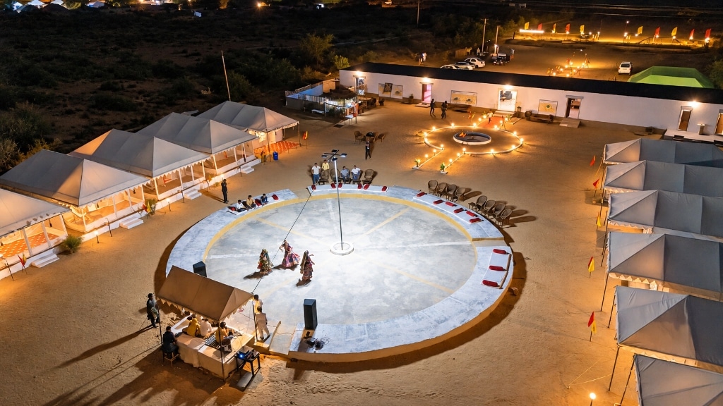 Traditional Kalbelia folk dance performance on the illuminated circular amphitheater stage